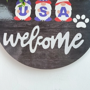 Patriotic USA Independence Day round wooden door sign with gnome design and welcome text