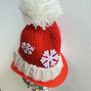 Knitted Christmas hat keychain with white snowflake patterns and a soft pompom