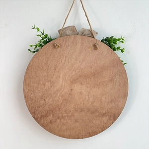 Independence Day round wooden door sign with rustic linen bow and artificial greenery decor