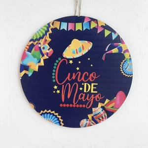 Wooden Cinco de Mayo round welcome sign with Mexican hat and festive party elements