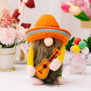 Detailed close-up of a festive Mexican gnome plush featuring a colorful sombrero and a guitar