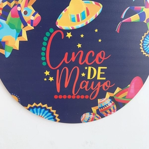 Detail of Cinco de Mayo wooden door sign with sombrero and colorful piñata elements