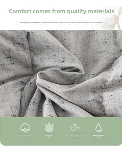Detail view of high-density breathable grey baby down jacket fabric with soft texture