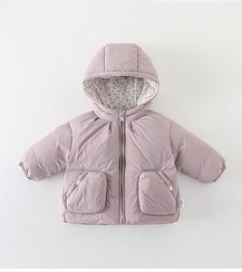Macro detail of toddler puffer jacket with floral lining and metallic zipper hardware