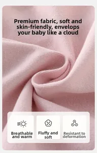 Gros plan sur un tricot côtelé rose doux montrant une texture respirante et agréable