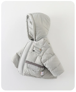Detailed view of grey quilted warm baby jacket with Yize embroidery and zipper closure