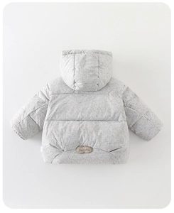 Detail view of light grey hooded baby down jacket with liberta leather patch and soft texture