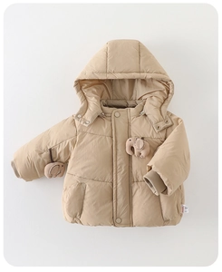 Detail of baby hooded winter jacket featuring cute plush elephant patches and rib cuffs
