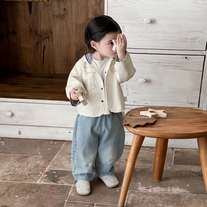 Toddler boy spring beige hooded jacket with dinosaur print and light blue denim jeans set