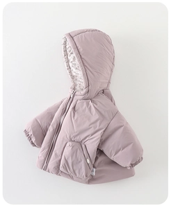 Detail view of baby puffer jacket featuring floral lining and windproof purple fabric