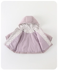 Flat lay of lavender baby winter jacket showing floral lining and drawstring hem