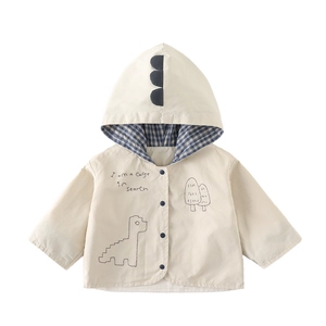 Beige hooded toddler jacket with dinosaur spikes and plaid lining in a clean flat lay view