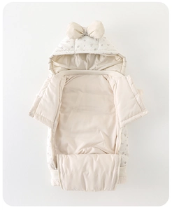 Detail of baby winter floral snowsuit featuring soft fleece lining and bow hood