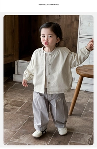 Detail view of baby cotton jacket and trousers set for casual outdoor toddler outfit