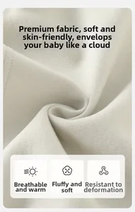 Gros plan sur le tissu en coton tricoté beige doux pour ensemble bébé