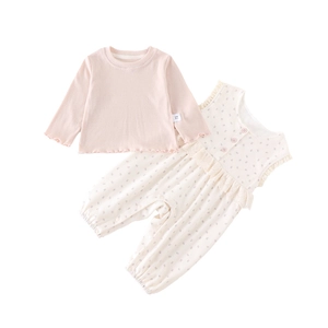 Ensemble deux pièces pour bébé fille avec haut rose à manches longues et barboteuse fleurie