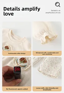 Détail d'ensemble bébé en gaufre avec broderie champignon et test de sécurité sans fluorescent