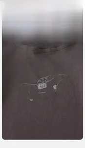 Detail of baby cotton sweatshirt featuring a cute dog on skateboard illustration print
