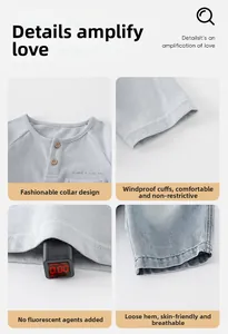 Detail of baby boy cotton outfit showing a Henley collar, windproof cuffs, and non-toxic fabric