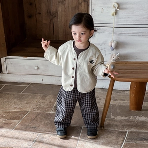 Baby boy three-piece outfit with cream cardigan, bear patch, and checkered trousers