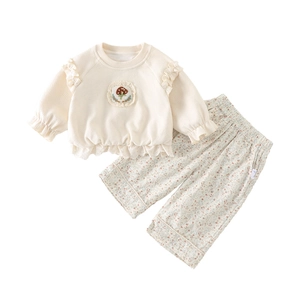 Ensemble fille crème avec broderie champignon et pantalon large à fleurs