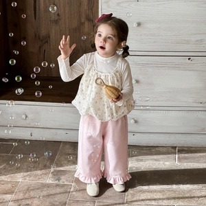 Sweet floral baby girl three-piece outfit with ruffles and cream long sleeve top