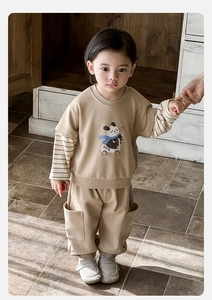Detail of baby boy cotton sweatshirt set with panda print and stylish cargo pockets