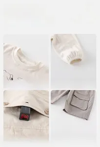 Detail shots of baby boys' cotton set showing neckline, cuffs, and eco-friendly fabric quality
