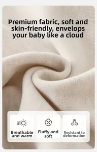 Close-up of soft breathable beige knit fabric texture for infant long sleeve romper