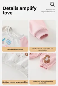 Detailed close-up of pink and grey cotton baby set showing ribbed cuffs and soft texture