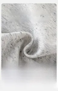 Macro detail of soft light gray mottled knit fabric texture for toddler spring set