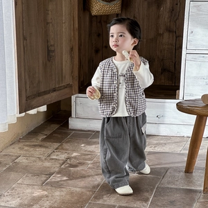 Toddler boy three-piece spring outfit with white bear tee, checkered vest, and gray pants