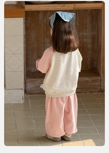 Detailed back view of pink and beige cotton knit tracksuit for toddler girls