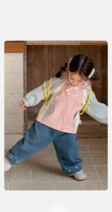 Close-up of pink and blue color-block hooded jacket with cute bear embroidery for girls