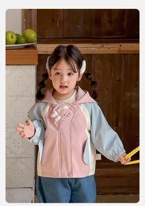 Detail of pink and blue color-block girls hooded windbreaker with cute bear embroidery
