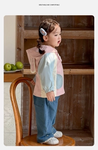 Detail of color-block windbreaker for girls featuring cute bunny ears on the hood
