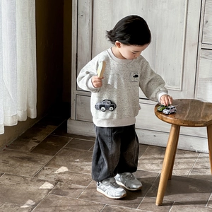 Grey toddler sweatshirt with car embroidery and dark grey denim pants two-piece outfit