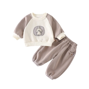Infant boy two-piece tracksuit with cartoon dog patch in cream and brown contrast colors