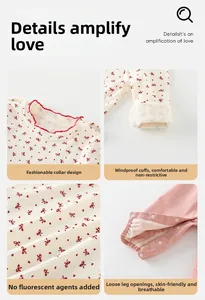 Détails du body bébé fille avec col à volants et motifs de nœuds en tissu doux