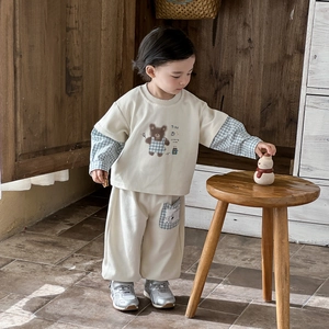 Toddler beige sweatshirt set with checkered sleeves and cartoon bear print for spring