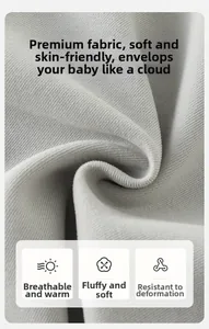Detailed macro shot of soft, breathable light gray high-density baby knit fabric