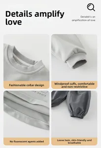 Detail view of ribbed crewneck, windproof cuffs and soft fabric for baby bear tracksuit
