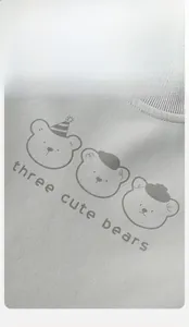 Close-up of grey cotton toddler sweatshirt featuring three cute bears cartoon graphic