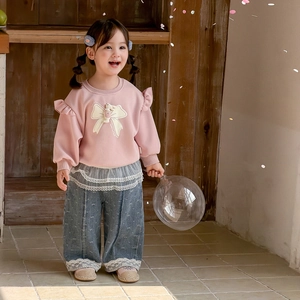 Toddler girl set featuring pink ruffle sweatshirt with bear and lace wide-leg jeans