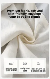 Close-up of soft white breathable cotton fabric texture for toddler vest and shirt set