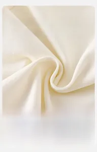 Detailed macro view of soft ribbed cotton fabric showing breathable and fluffy texture