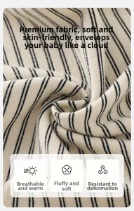 Gros plan sur le tissu en coton tricoté rayé doux montrant sa texture et son élasticité