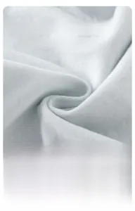 Detailed close-up of light blue ribbed knit baby fabric with soft breathable texture