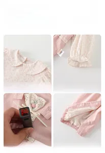 Detail of baby girl floral romper with lace collar showing zero fluorescence safety test