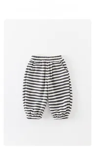 Close-up of baby striped jogger pants with elastic waistband and side pockets